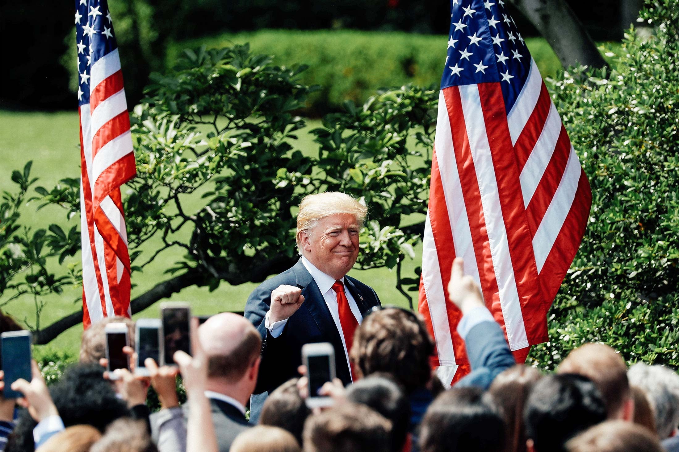 Donald Trump pumps his fist as he departs his “Celebration of America” event on the South Lawn of the White House in Washington on Tuesday.