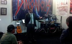 State Rep. Ruben Gallego speaks to constituents in a Phoenix guitar shop.