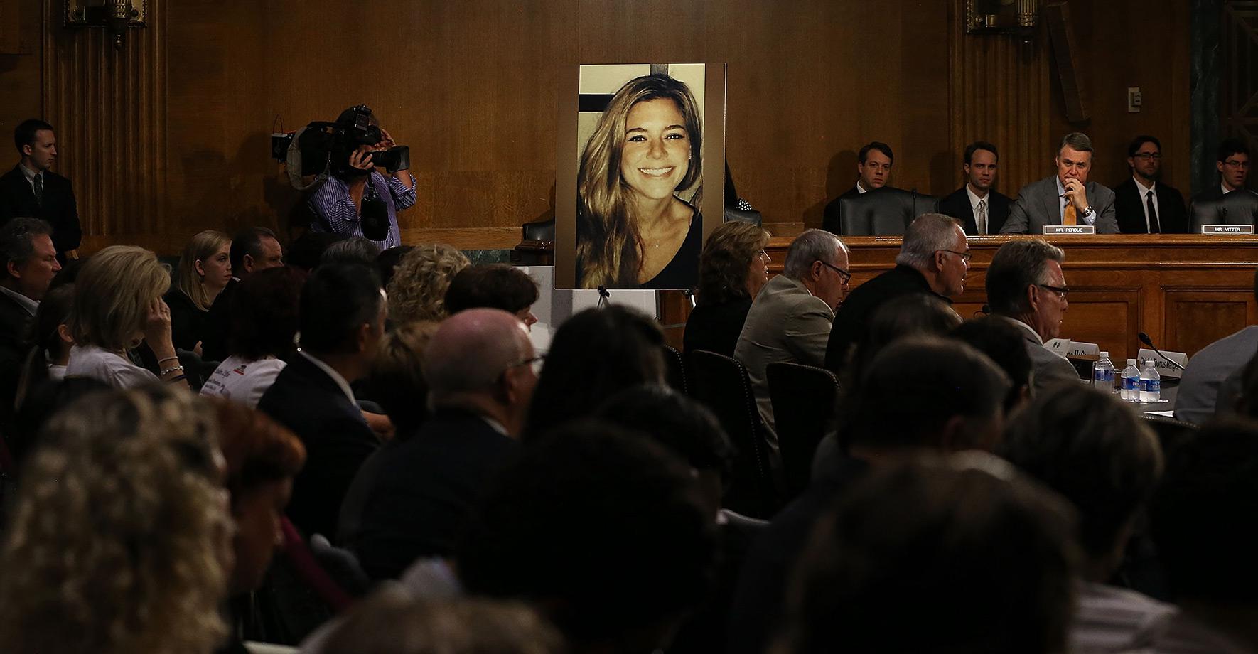 A large photo of Kathryn “Kate” Steinle, who was killed by an illegal immigrant in San Francisco, is shown while her dad, Jim Steinle, testifies during a Senate Judiciary Committee hearing on Capitol Hill on July 21, 2015.