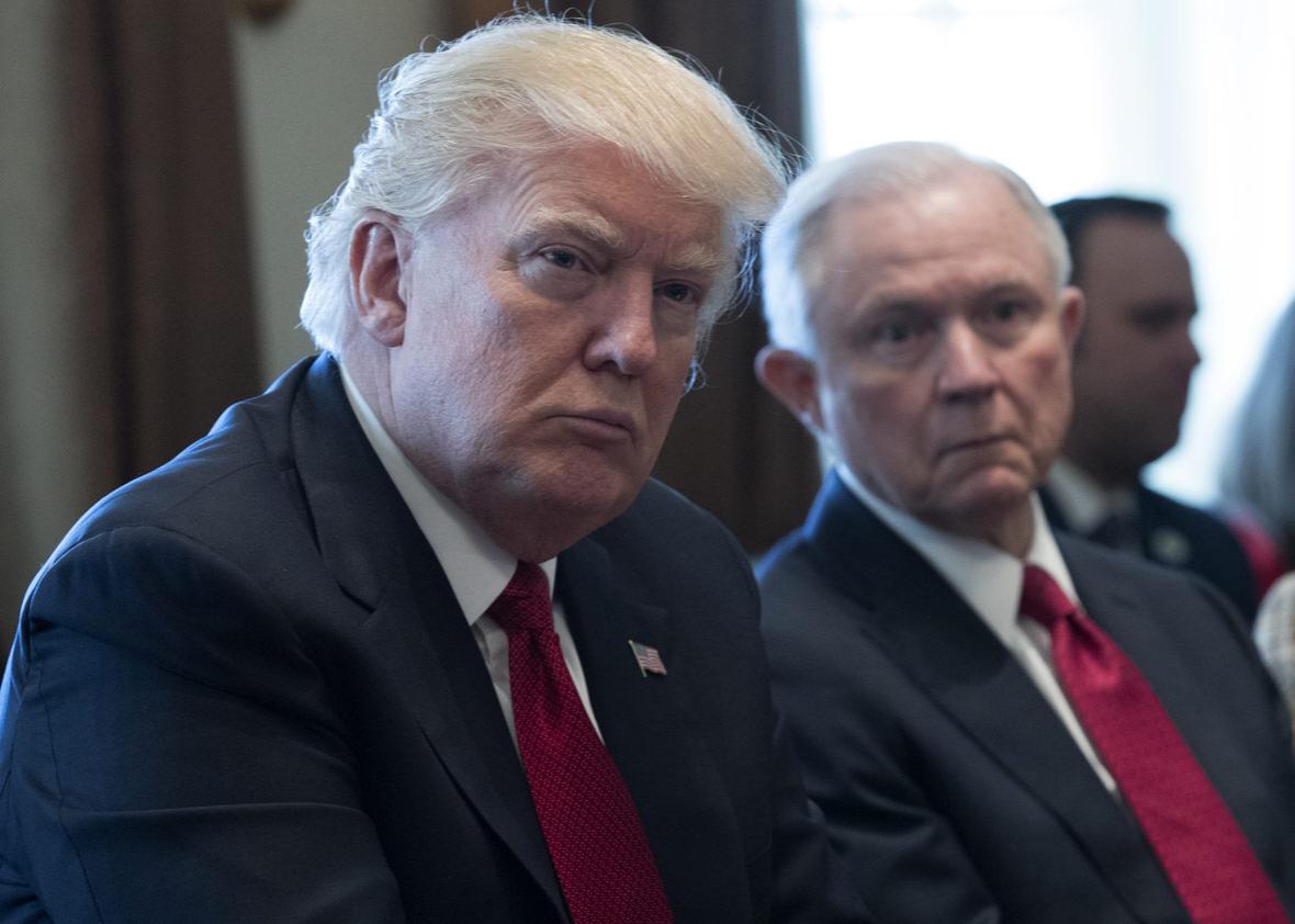 U.S. President Donald Trump (L) and Attorney General Jeff Sessions (R) 