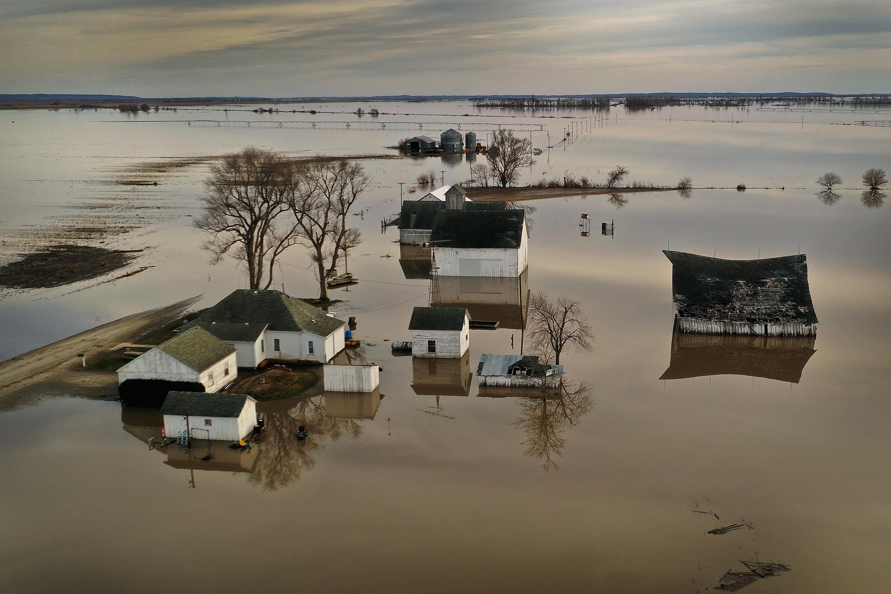 Floodwater surrounds a Missouri farm.