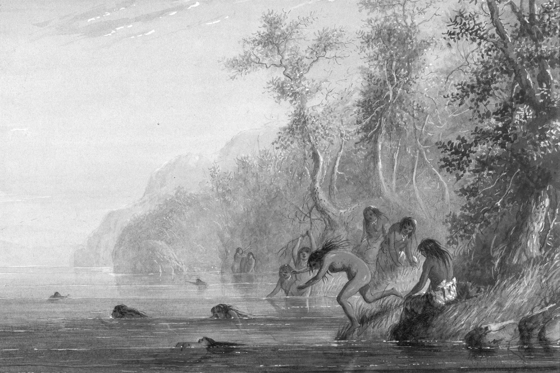 A group of women swimming and diving.