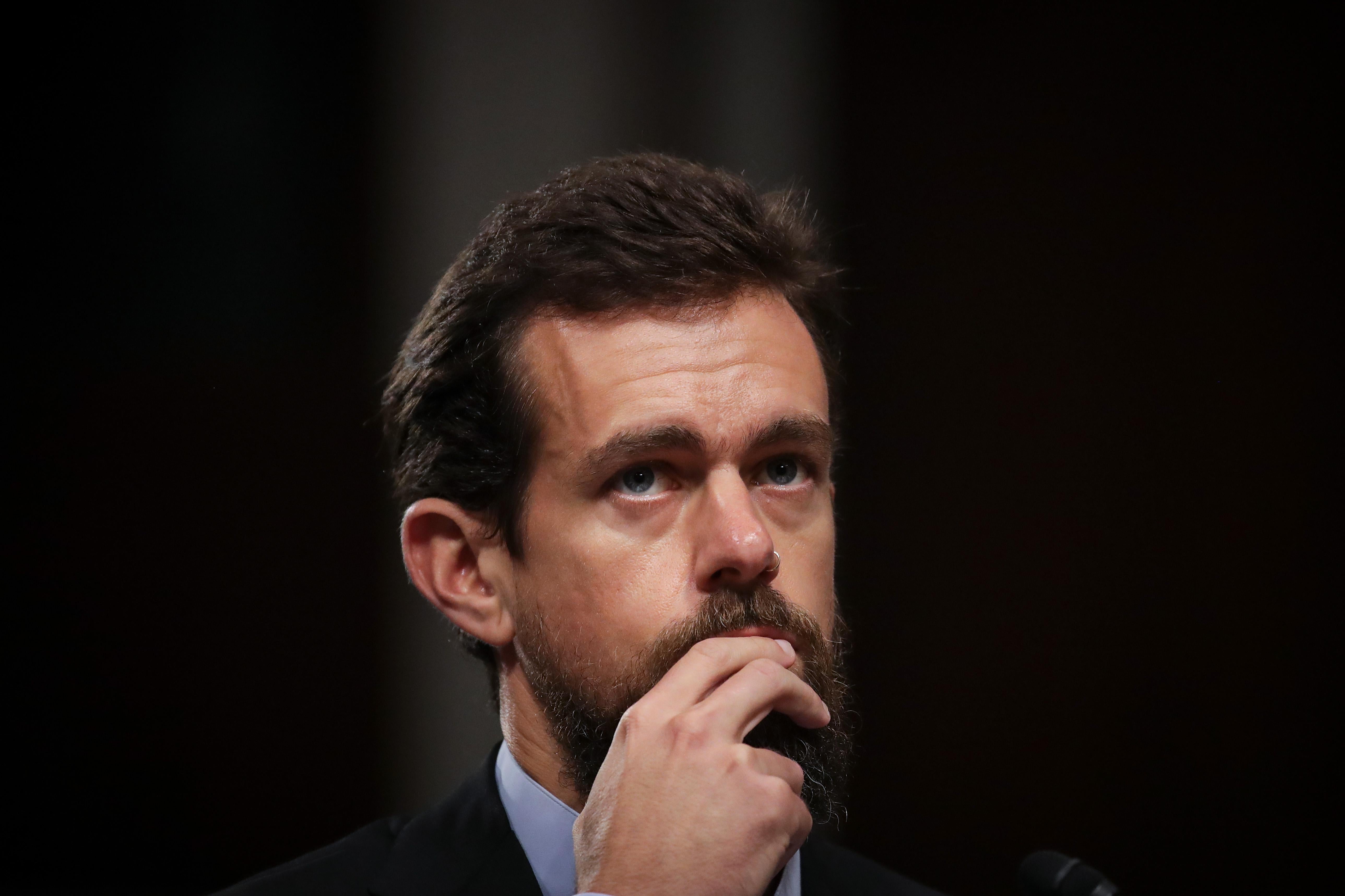 Twitter CEO Jack Dorsey with a thoughtful expression on his face at a congressional hearing.