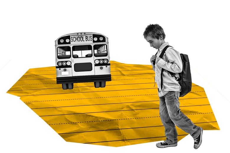 A boy with a backpack on watches a bus pulling away into the distance.