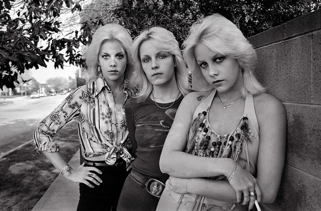 I was hired by Nippon Phonogram Records in Japan to do this sess,I was hired by Nippon Phonogram Records in Japan to do this session of The Runaways lead singer Cherie Currie at her San Fernando Valley home in 1977. Her identical twin sister Marie, pictured on the left, immediately caught my eye and I insisted on her joining the photo shoot. The stunning blonde in the center is a teenage Vickie Ronald who was in my class at Van Nuys High School. 