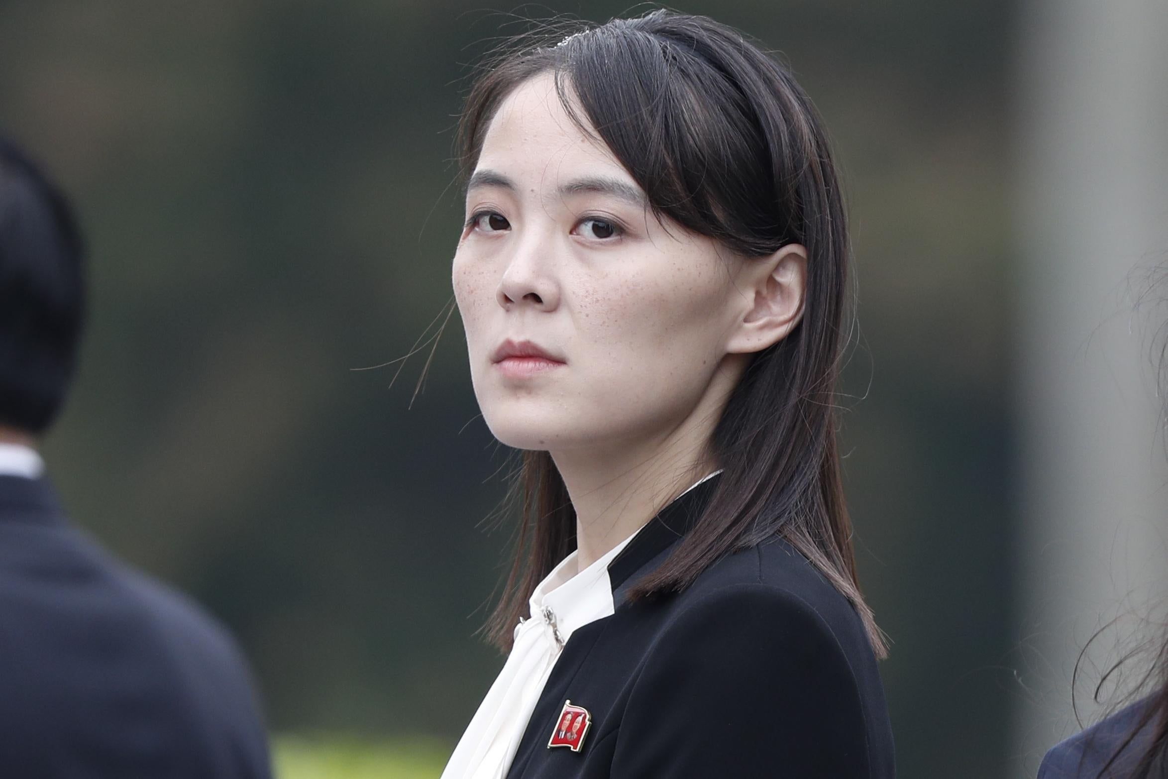 Kim Yo-jong looks back over her shoulder at the camera.