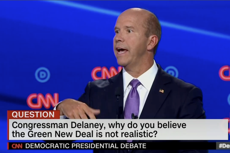 In this screengrab from CNN, Tom Delaney debates. The banner reads: "Congressman Delaney, why do you believe the Green New Deal is not realistic?"