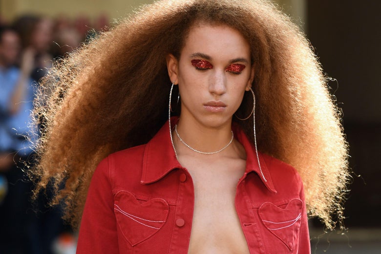 Model with frizzy hair.