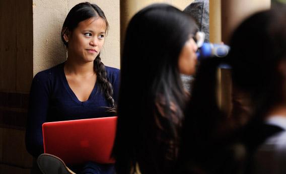 Students take a break at Royce Hall on the campus of UCLA in April in Los Angeles, California. 