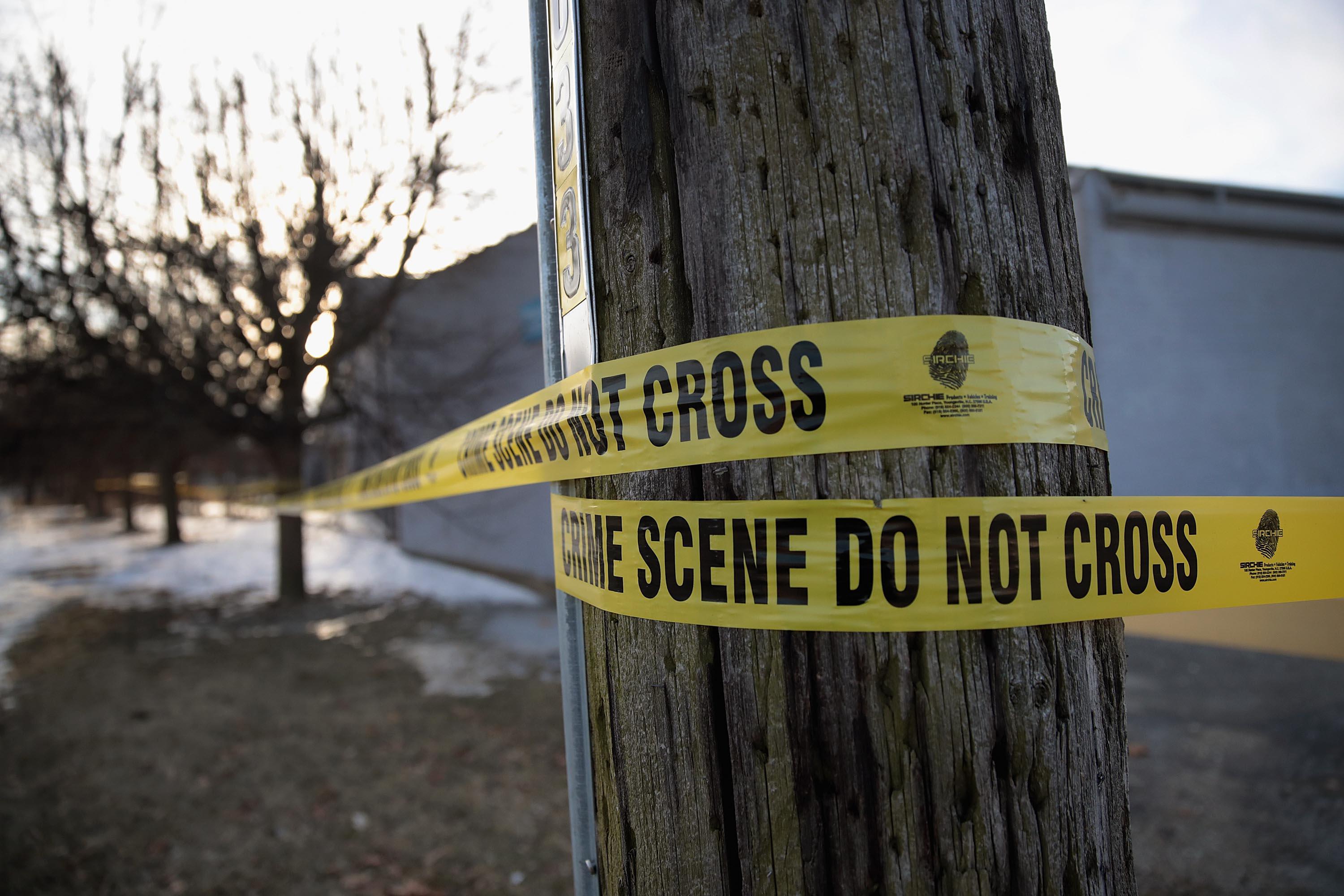 Crime scene tape surrounds the Shetland Business Park on February 16, 2019 in Aurora, Illinois. 