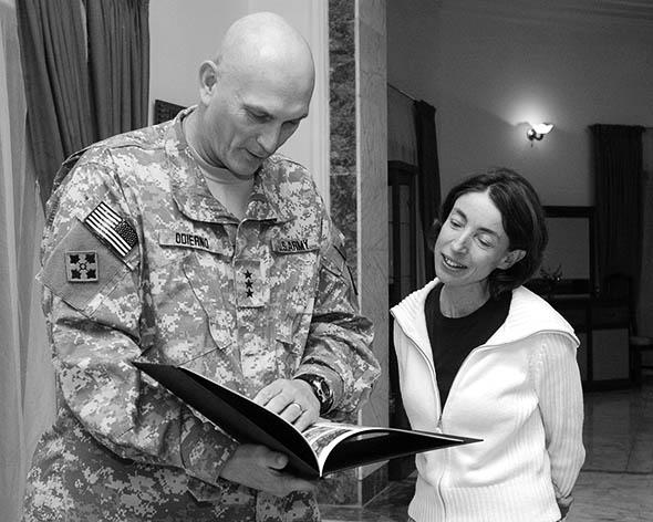 Lieutenant General Odierno presenting Sky with photo album of her time as his political adviser in Iraq.