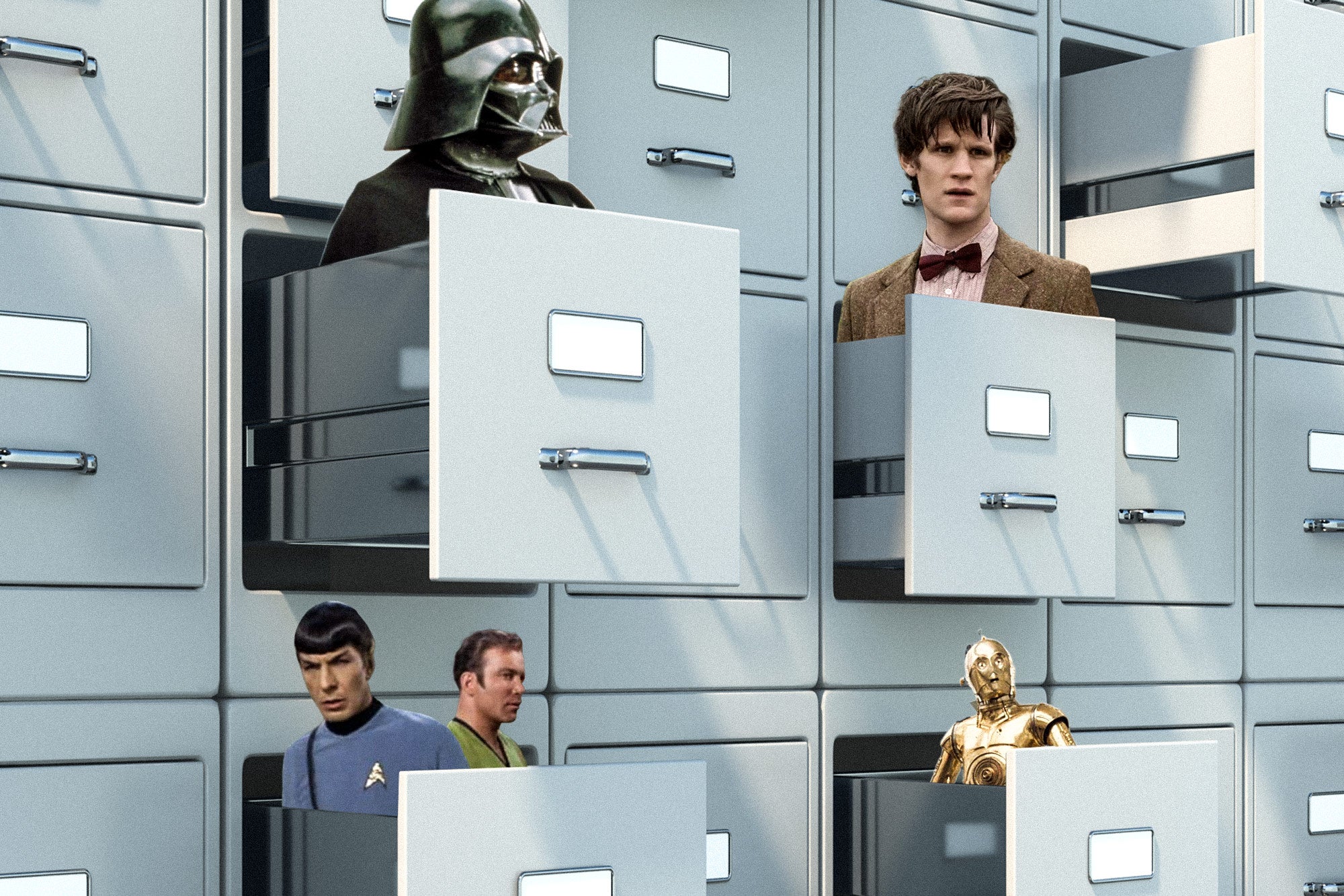 In a row of file cabinets, Darth Vader, Matt Smith as the Doctor, Kirk and Spock, and C-3PO pop up from open drawers.