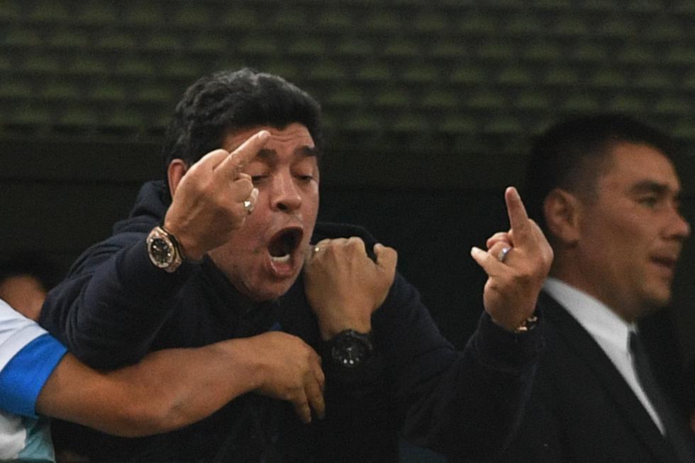Retired Argentina player Diego Maradona gestures during the Russia 2018 World Cup Group D football match between Nigeria and Argentina at the Saint Petersburg Stadium in Saint Petersburg on June 26, 2018. (Photo by OLGA MALTSEVA / AFP) / RESTRICTED TO EDITORIAL USE - NO MOBILE PUSH ALERTS/DOWNLOADS (Photo credit should read OLGA MALTSEVA/AFP/Getty Images)