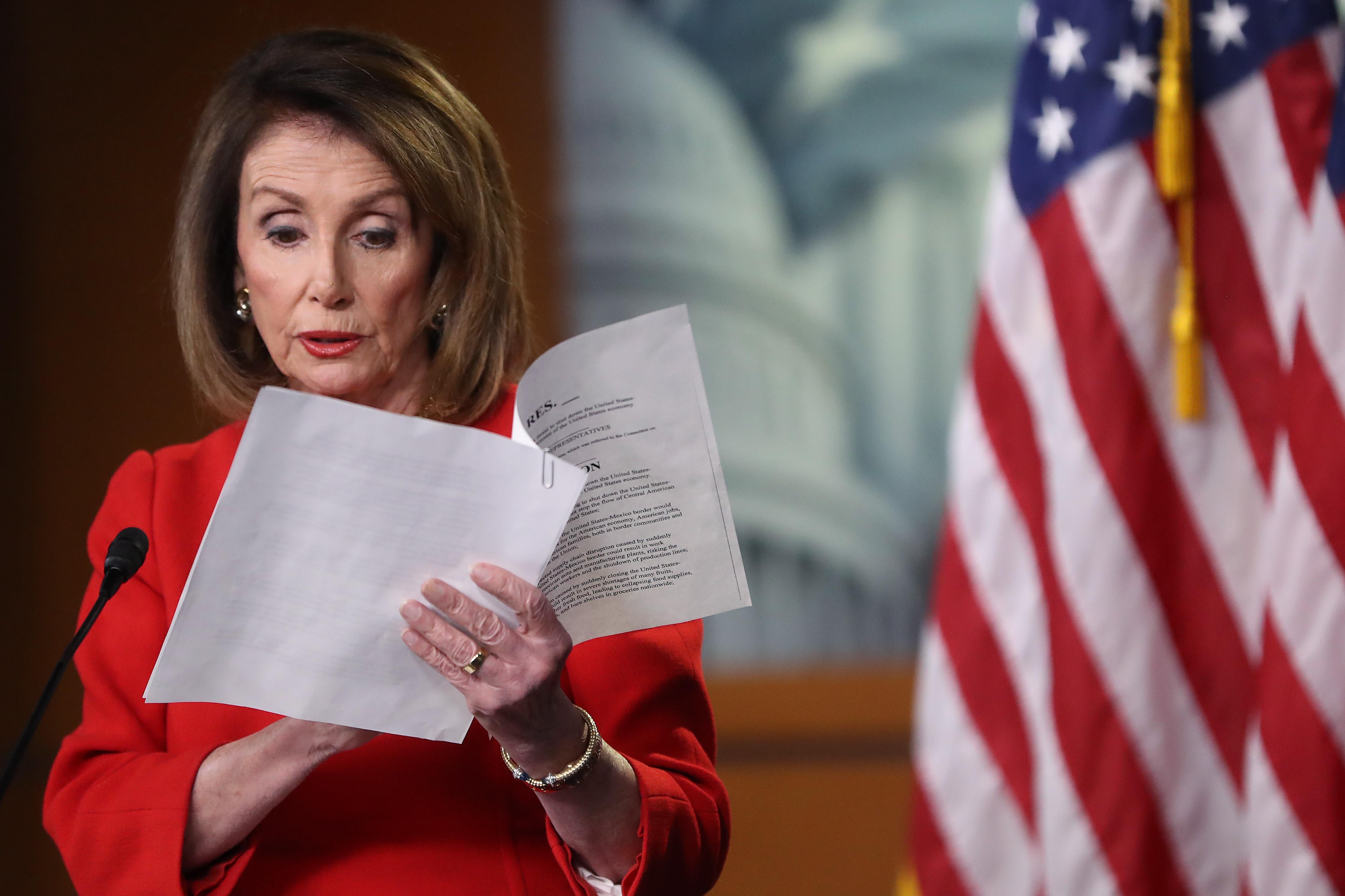 Speaker of the House Nancy Pelosi reads from a paper during her weekly news conference at the U.S. Capitol April 4, 2019 in Washington, DC.