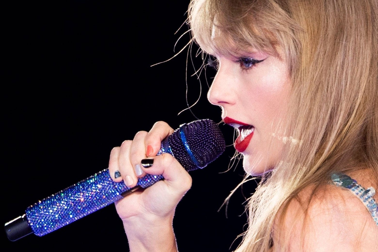 Taylor Swift with a mic