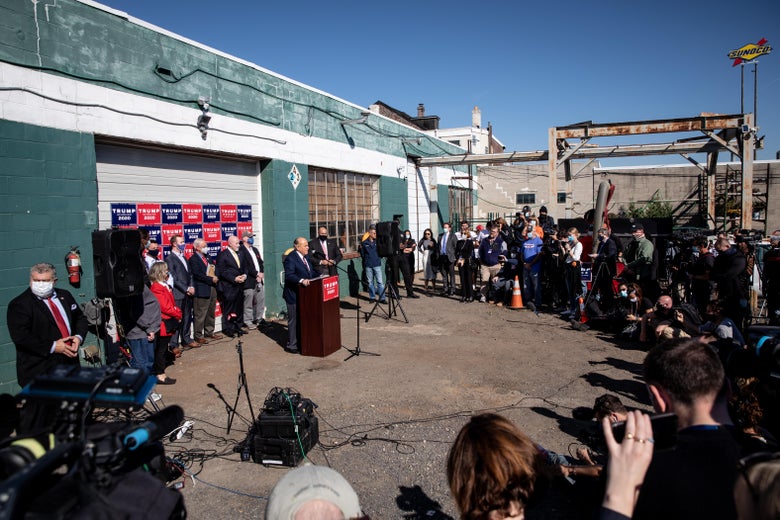 Rudy Giuliani speaks to the media at a press conference held in the back parking lot of landscaping company on November 7, 2020 in Philadelphia, Pennsylvania. 