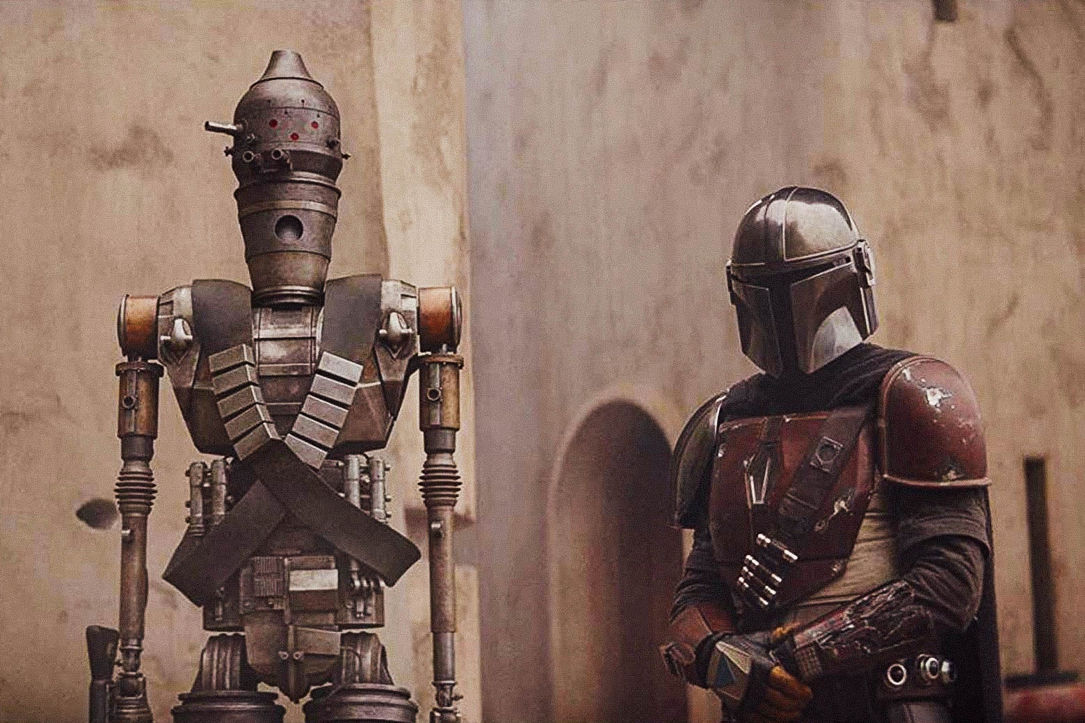 IG-11, a droid voiced by Taika Waititi, and Pascal as the Mandalorian.