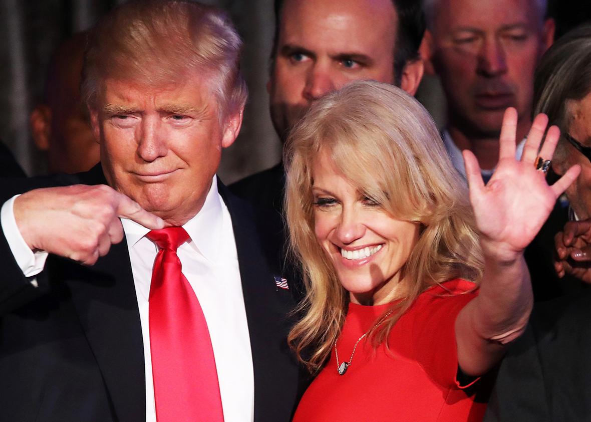 Republican president-elect Donald Trump along with his campaign manager Kellyanne Conway acknowledge the crowd during his election night event at the New York Hilton Midtown in the early morning hours of November 9, 2016 in New York City. 