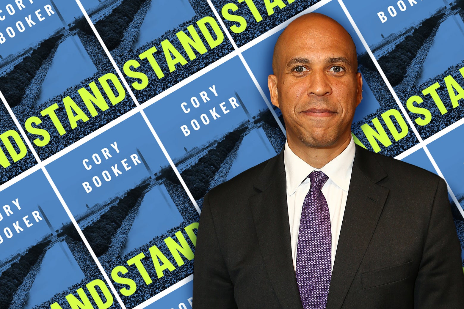 Cory Booker, standing in front of the cover of his new book.