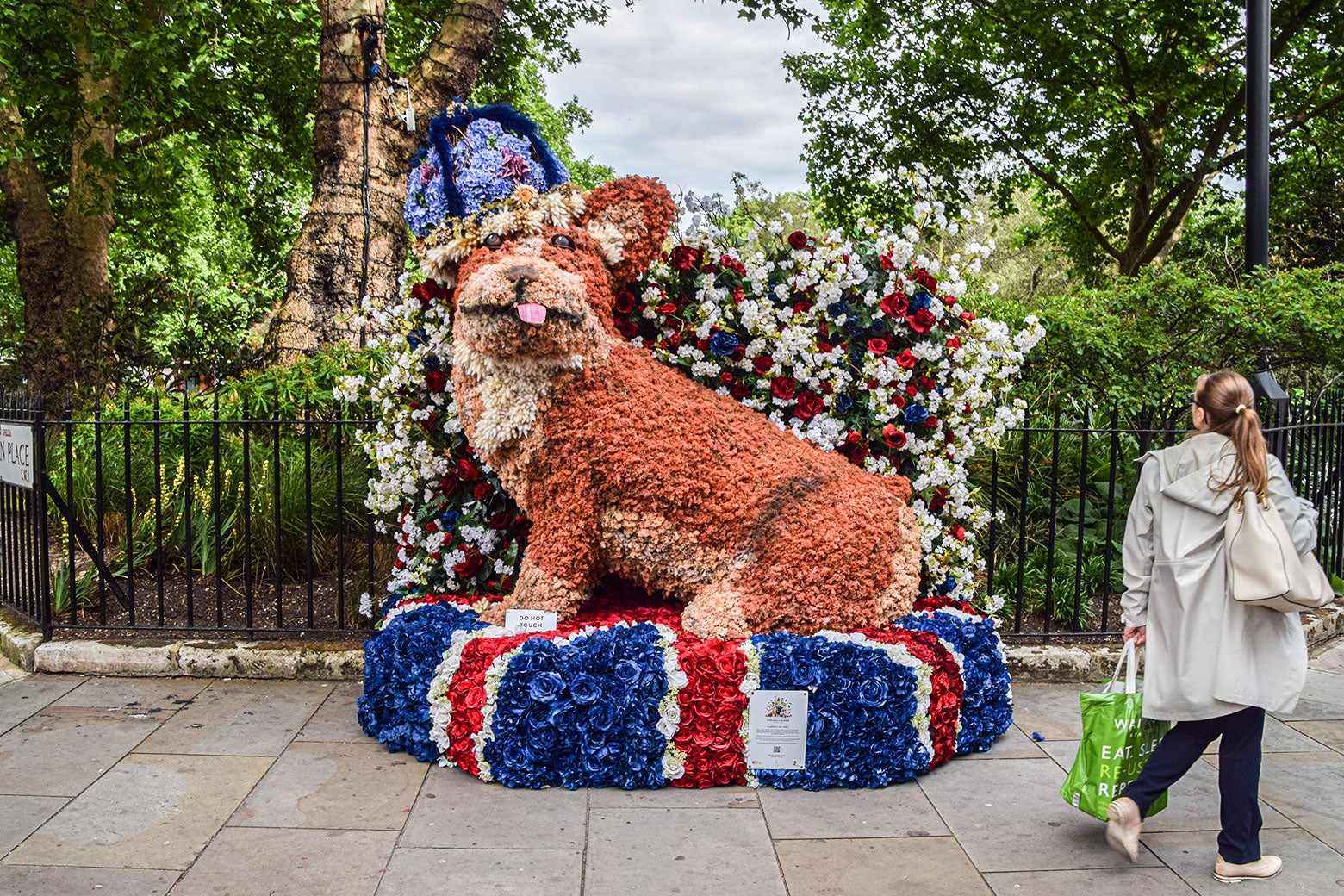 A big floral sculpture of the dog Clarence the Corgi. 