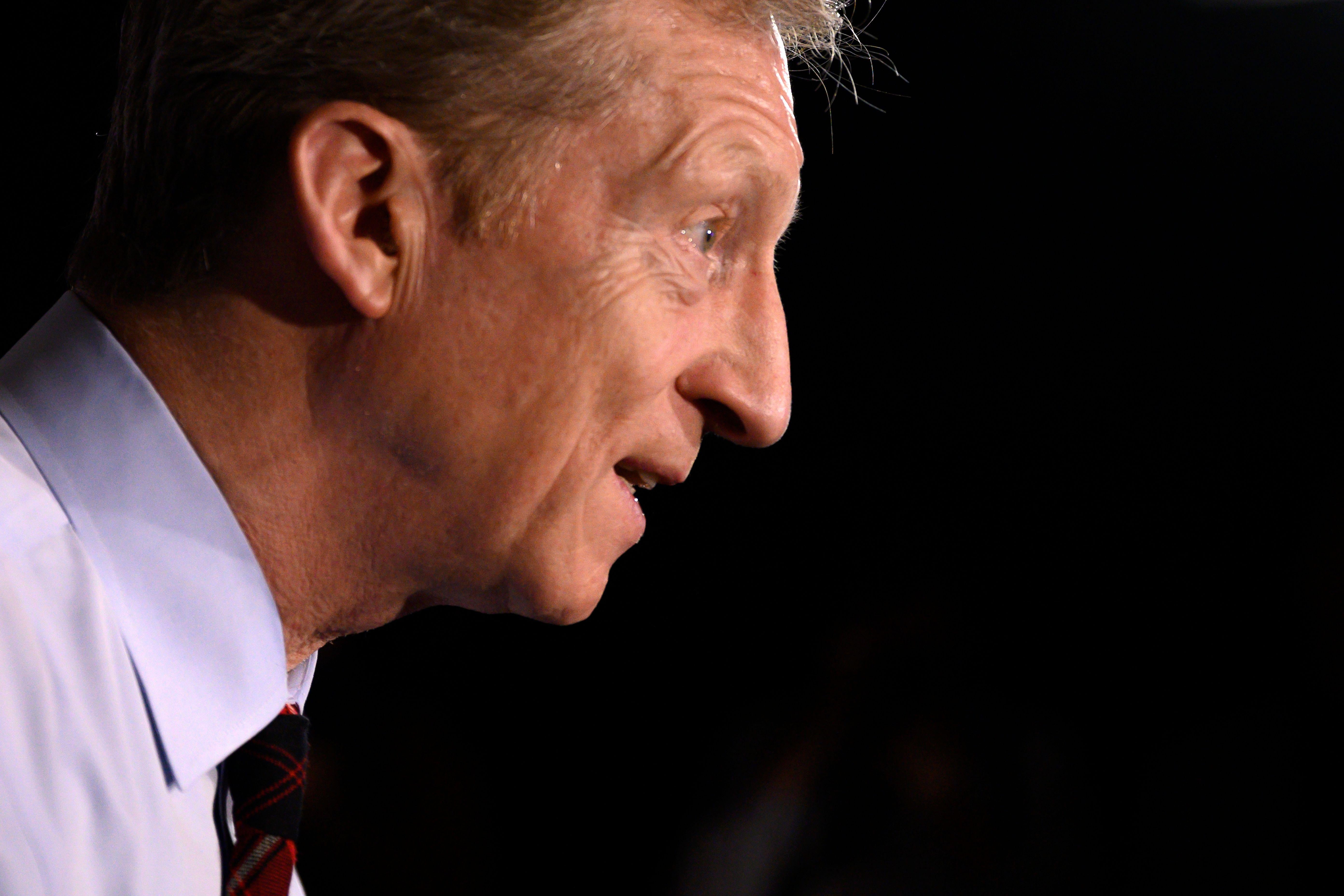 A profile photo of democratic presidential hopeful Tom Steyer's face as he speaks during a town hall.