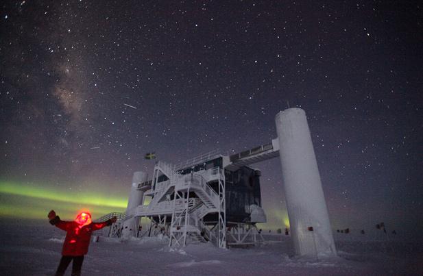 A scientist enjoys the winter cold and darkness outside the Ice Cube Laboratory at Amundsen-Scott South Pole Station, on August 17, 2012. 