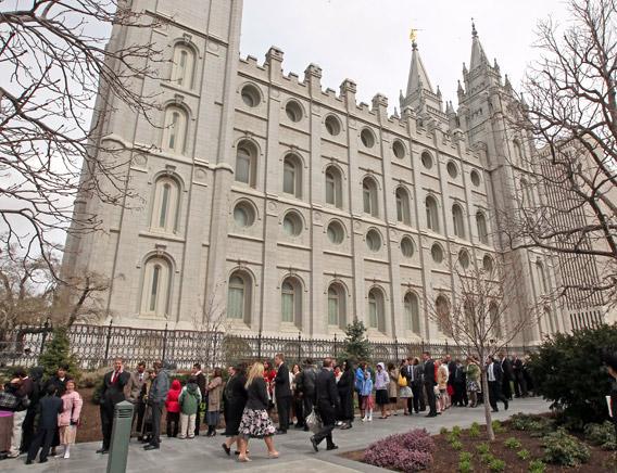 Mormon faithful line up outside the historic Salt Lake Temple.