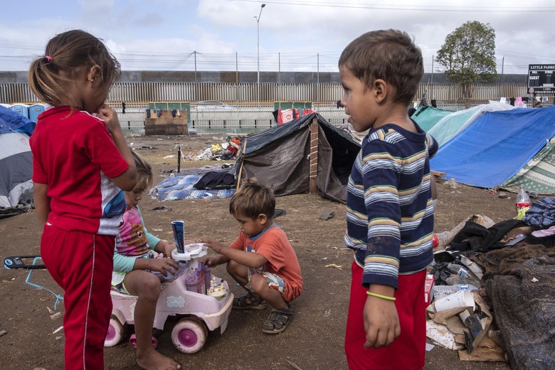 Migrant children trying to reach the U.S. play at a temporary shelter in Tijuana, Baja California State, Mexico, near the border with the US, on November 30, 2018.