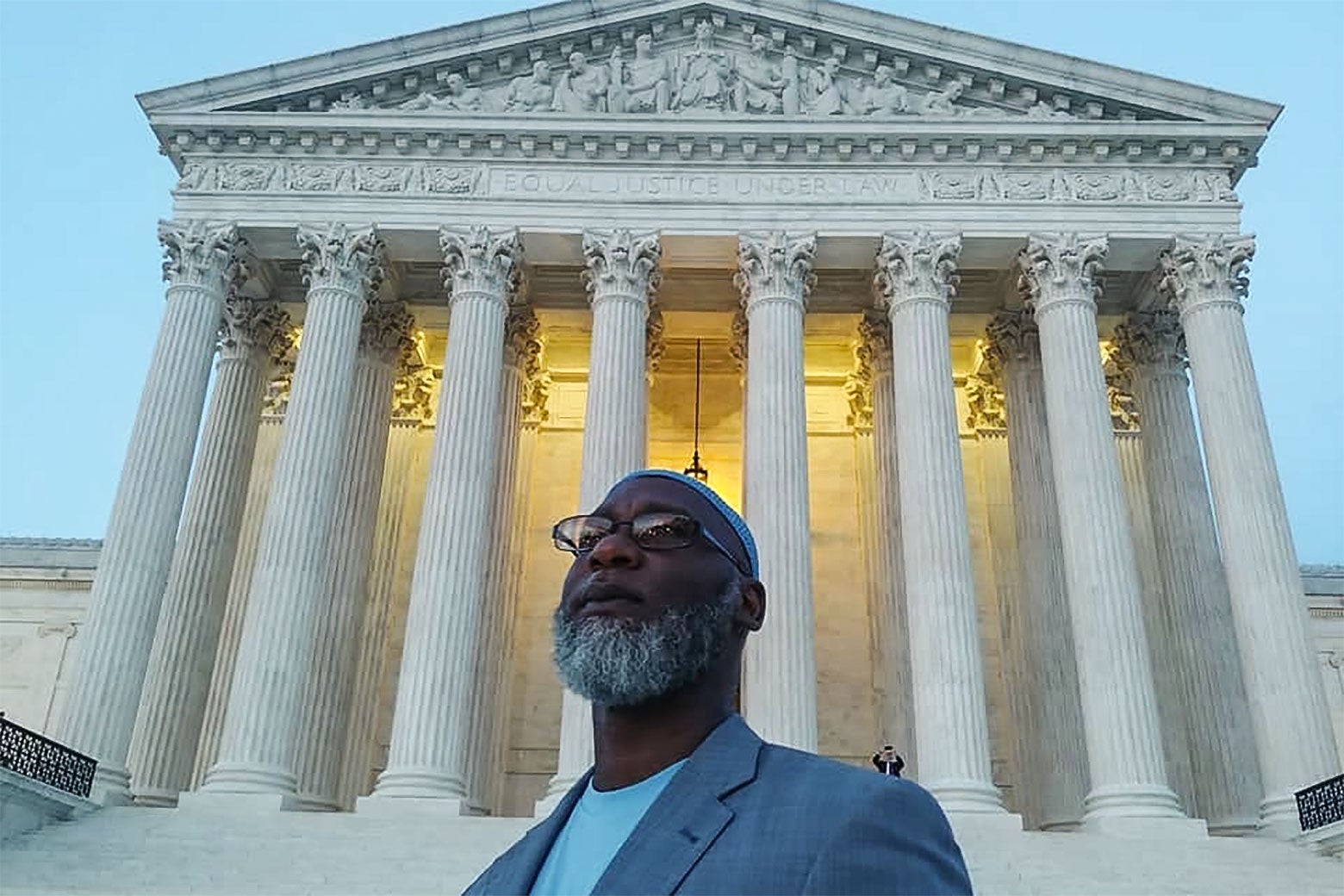 Abd’Allah Lateef stands in front of the Supreme Court.