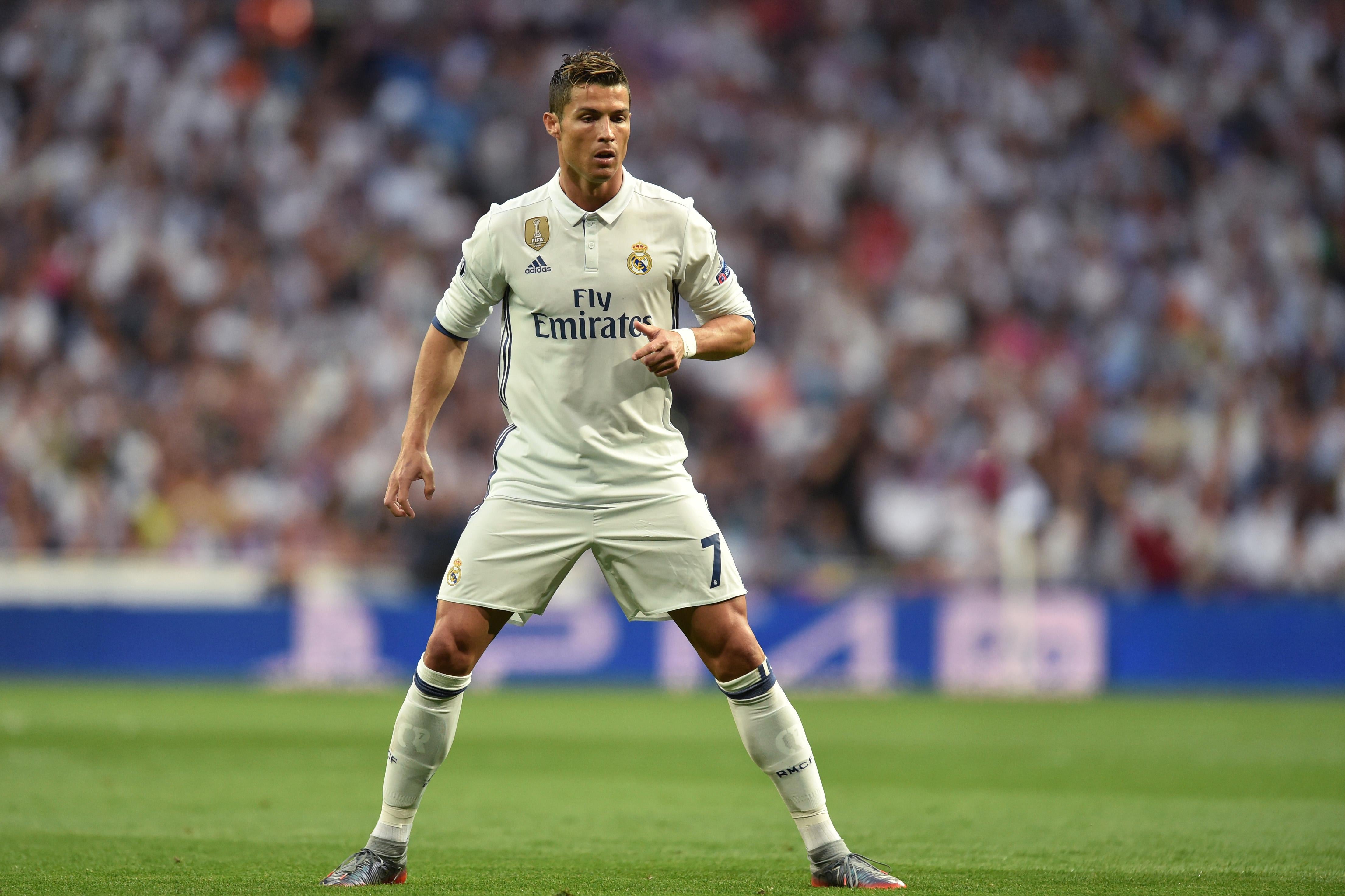Real Madrid's Portuguese forward Cristiano Ronaldo prepares for a free kick.