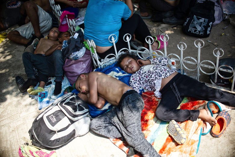 Central American migrant children en route to the U.S. border rest near Huehuetan, Chiapas state, Mexico, on April 15, 2019. 