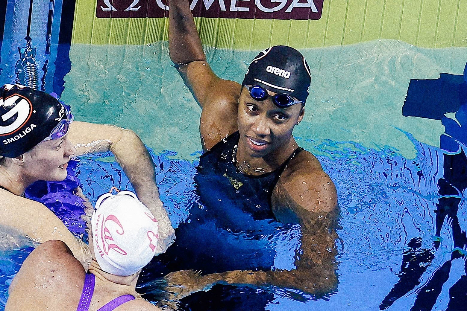 Hinds in the pool looking up after her race