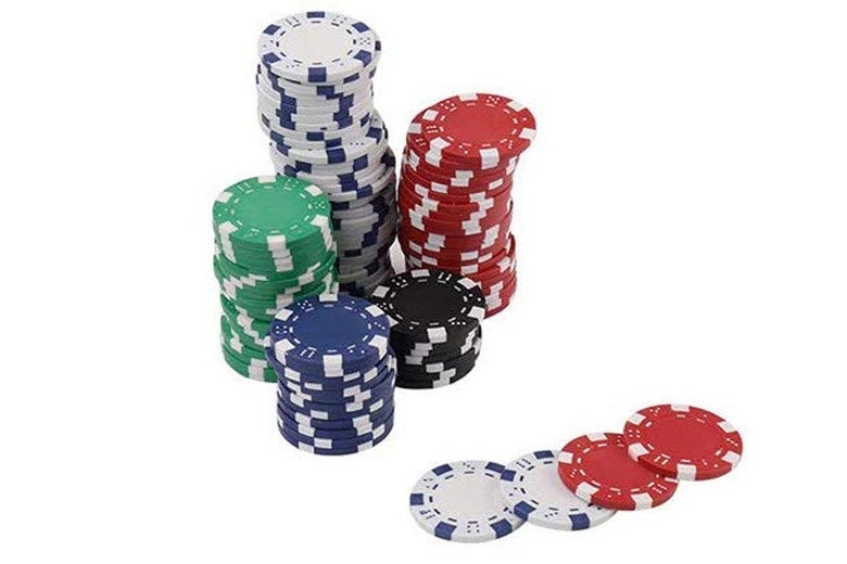 Poker chips stacked.