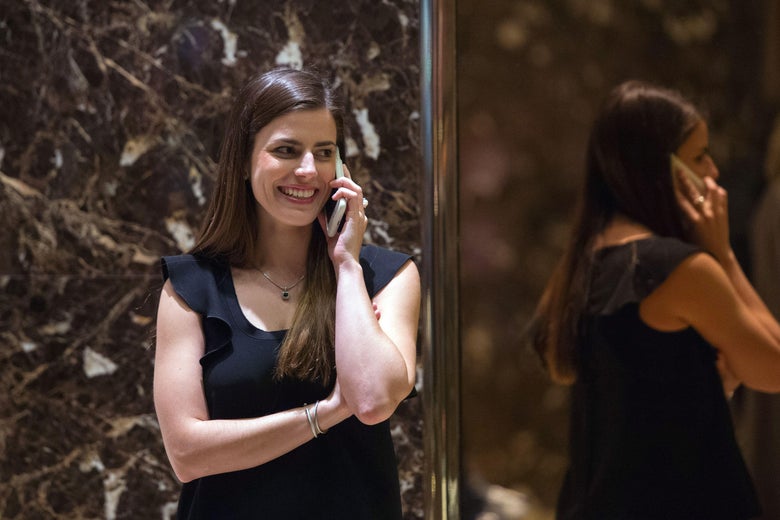 Madeline Westerhout talks on the phone in the lobby of Trump Tower, November 30, 2016 in New York.