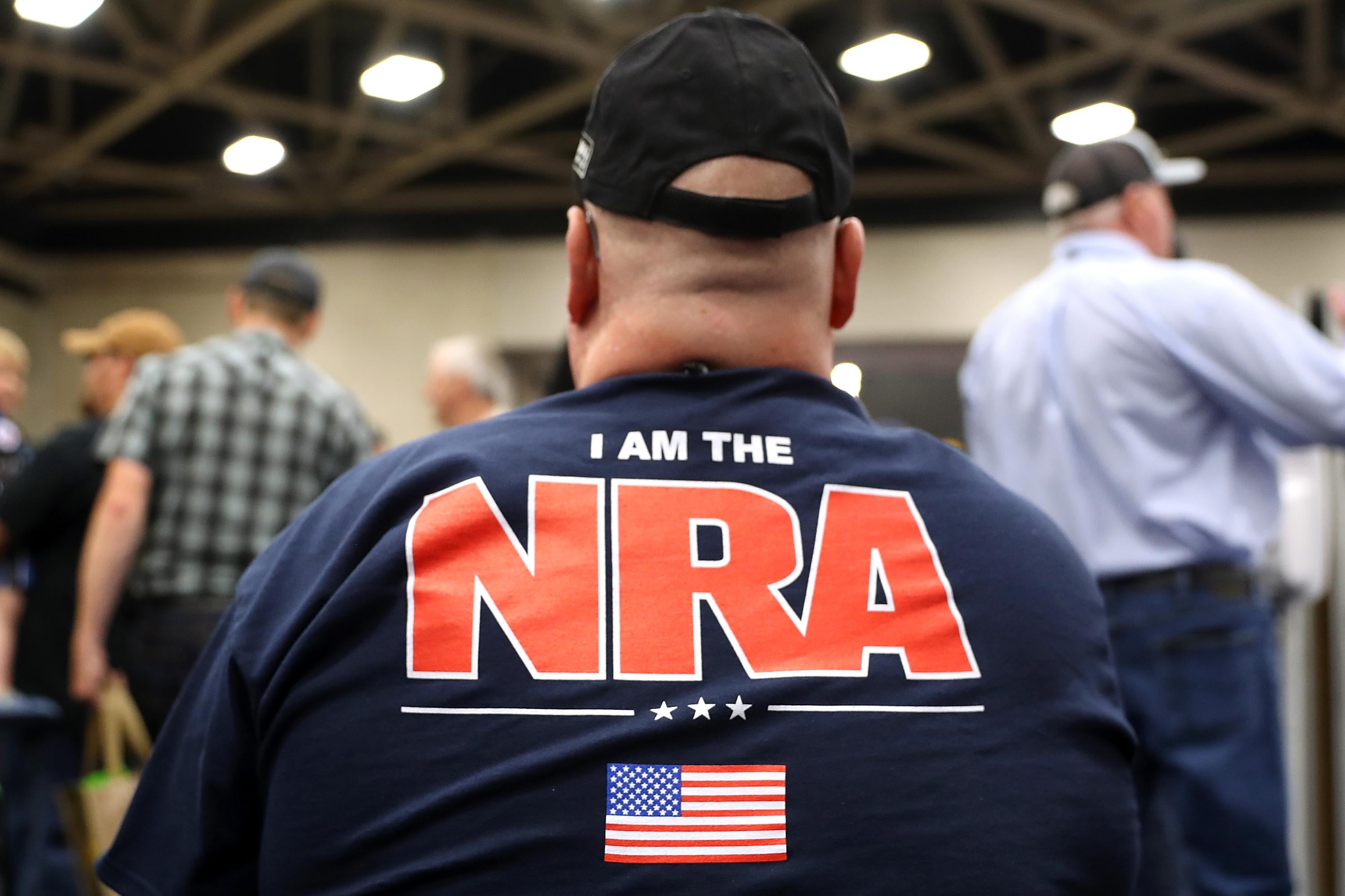 An man wears an NRA shirt on May 5 in Dallas.