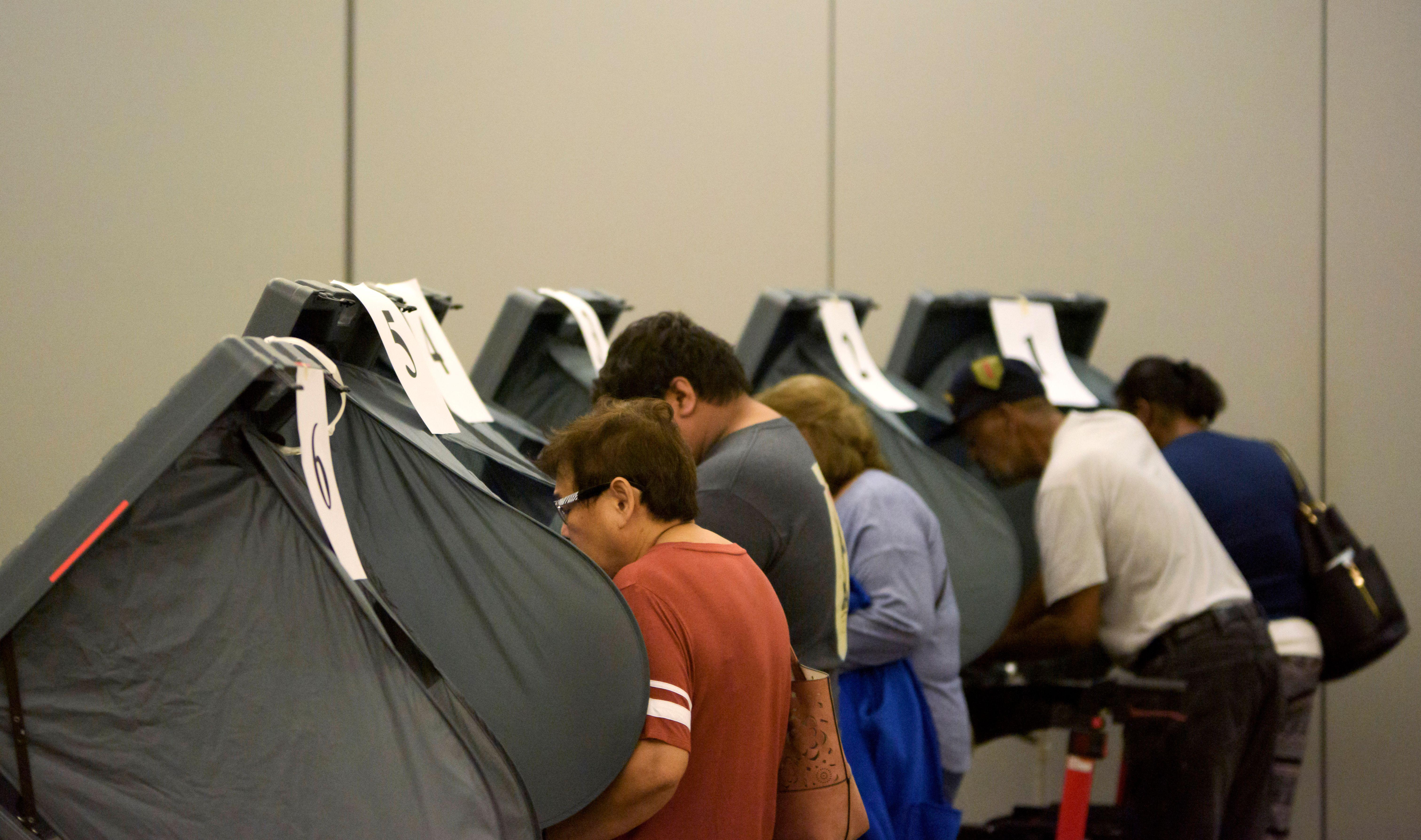 Texas Man Who Waited Hours to Vote Is Arrested, Charged With Illegal Voting