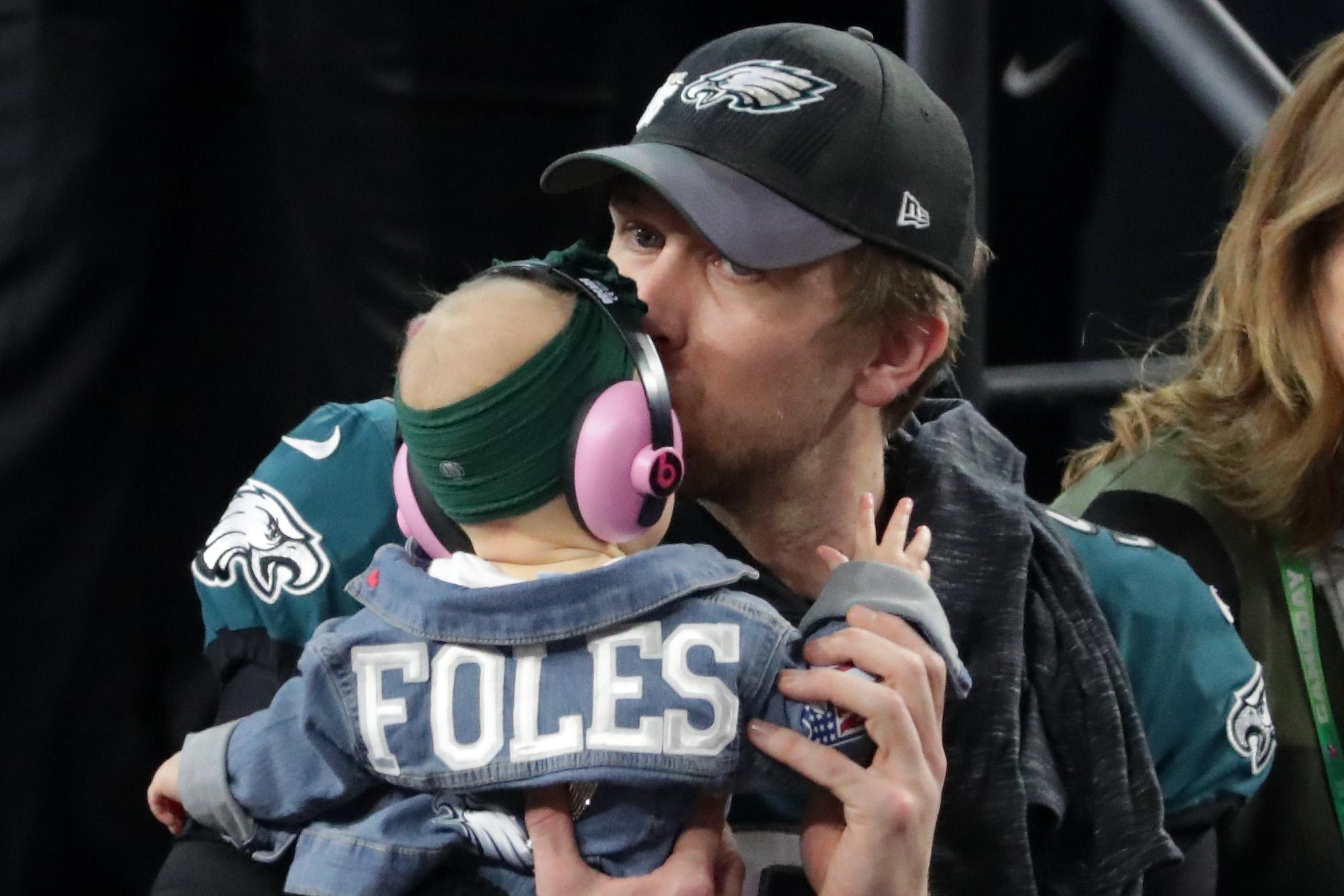 MINNEAPOLIS, MN - FEBRUARY 04:  Nick Foles #9 of the Philadelphia Eagles celebrates with his daughter Lily Foles after his 41-33 victory over the New England Patriots in Super Bowl LII at U.S. Bank Stadium on February 4, 2018 in Minneapolis, Minnesota. The Philadelphia Eagles defeated the New England Patriots 41-33.  (Photo by Streeter Lecka/Getty Images)
