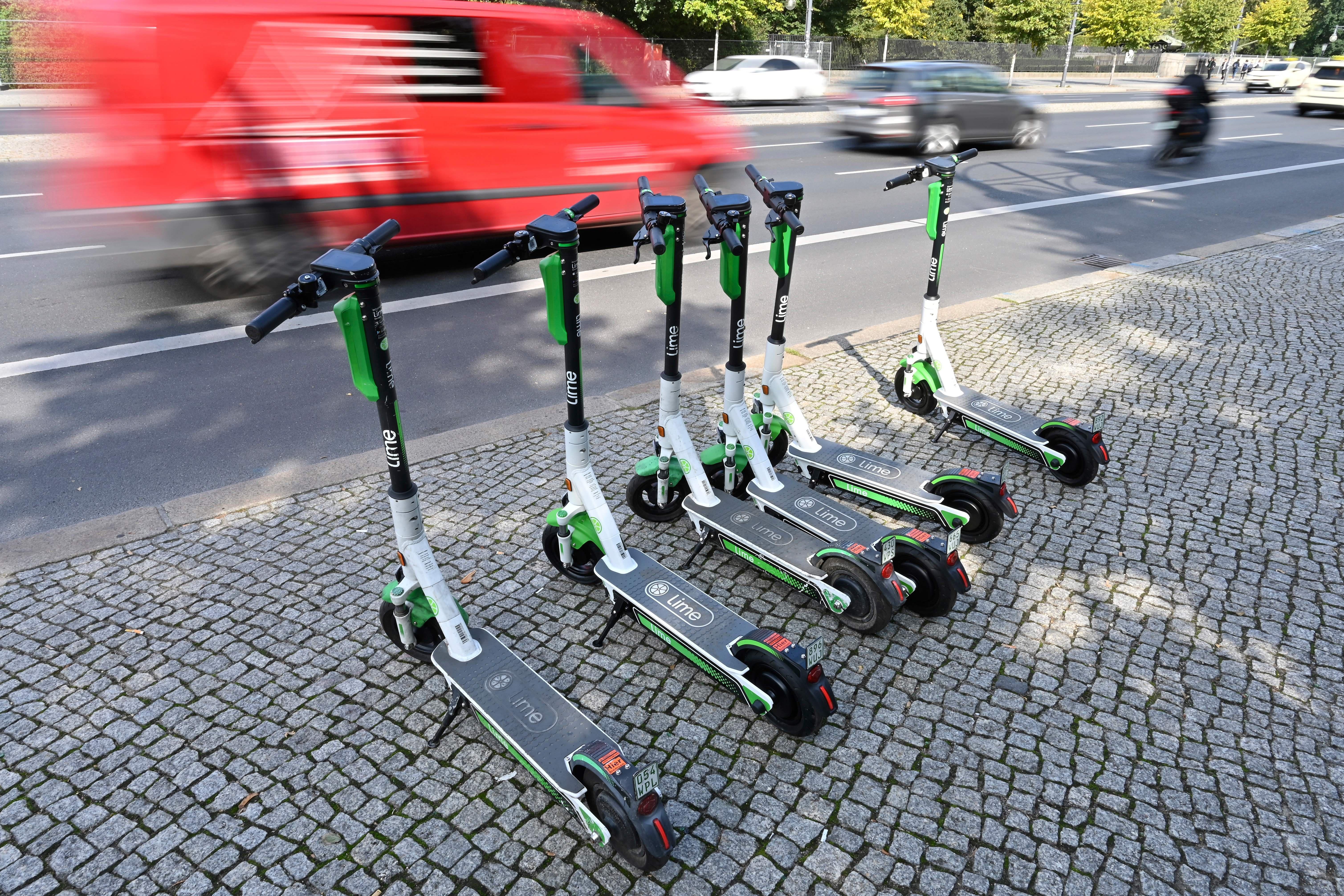 A row of e-scooters on a Berlin sidewalk on Sept. 13, 2019.
