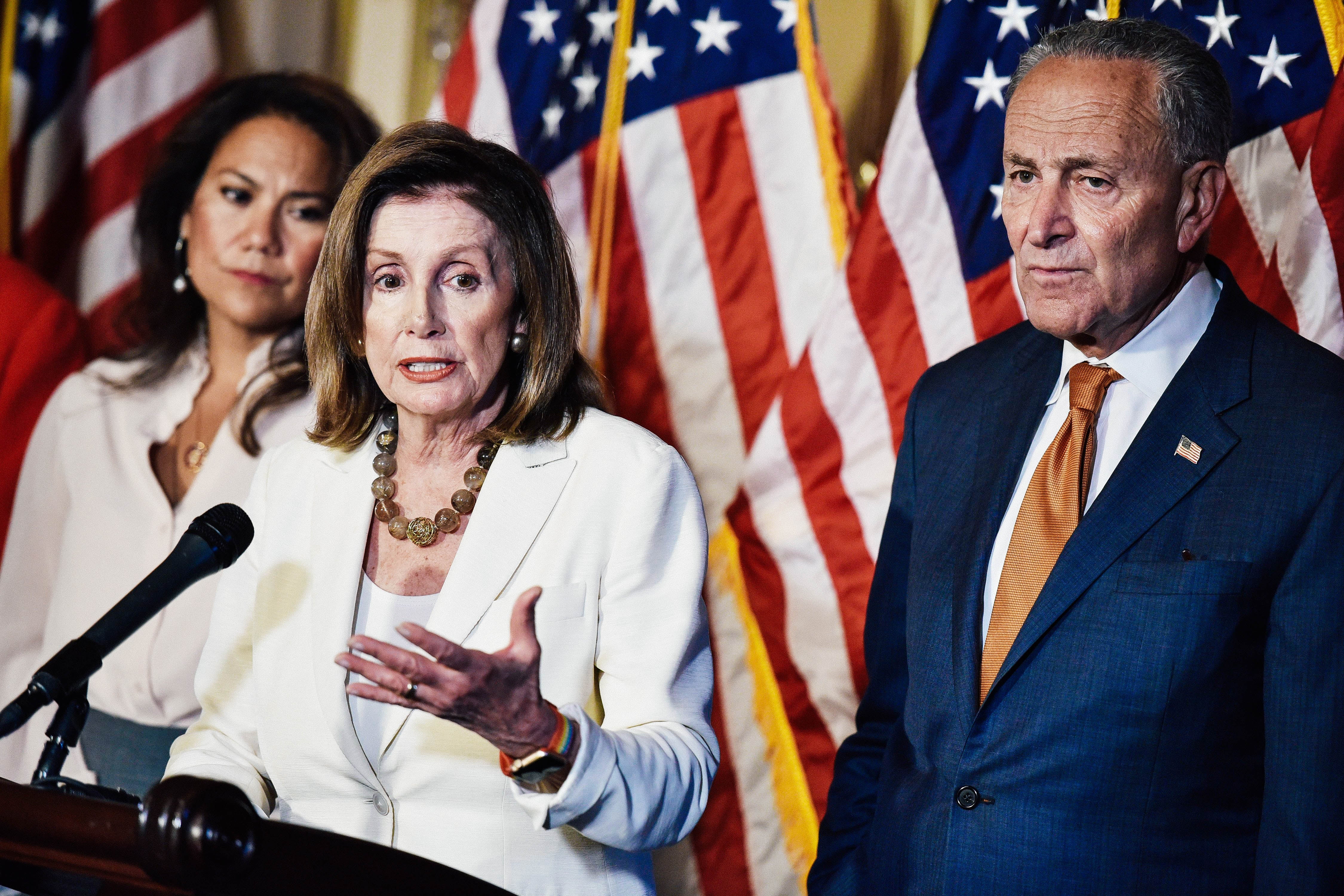 Rep. Veronica Escobar, House Speaker Nancy Pelosi, and Senate Minority Leader Chuck Schumer on Sept. 9 in Washington.