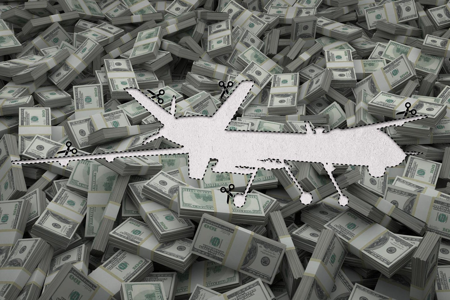 A pile of American dollars with an image of a military drone cut out of it. 