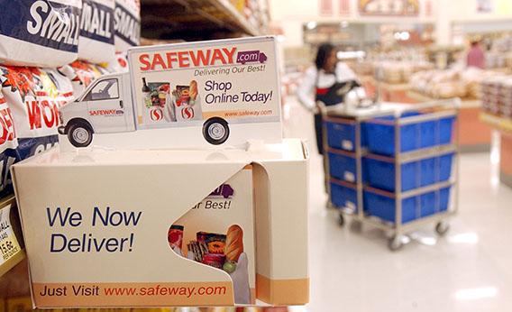 An advertisement for the new Safeway.com sits on a shelf at a Safeway store March 13, 2002, in San Francisco.
