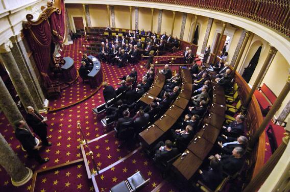 Members of the U.S. Senate sit down to a bipartisan caucus in the Old Senate Chamber on the first day of the 110th Congress at the U.S. Capitol in Washington January 4, 2007.