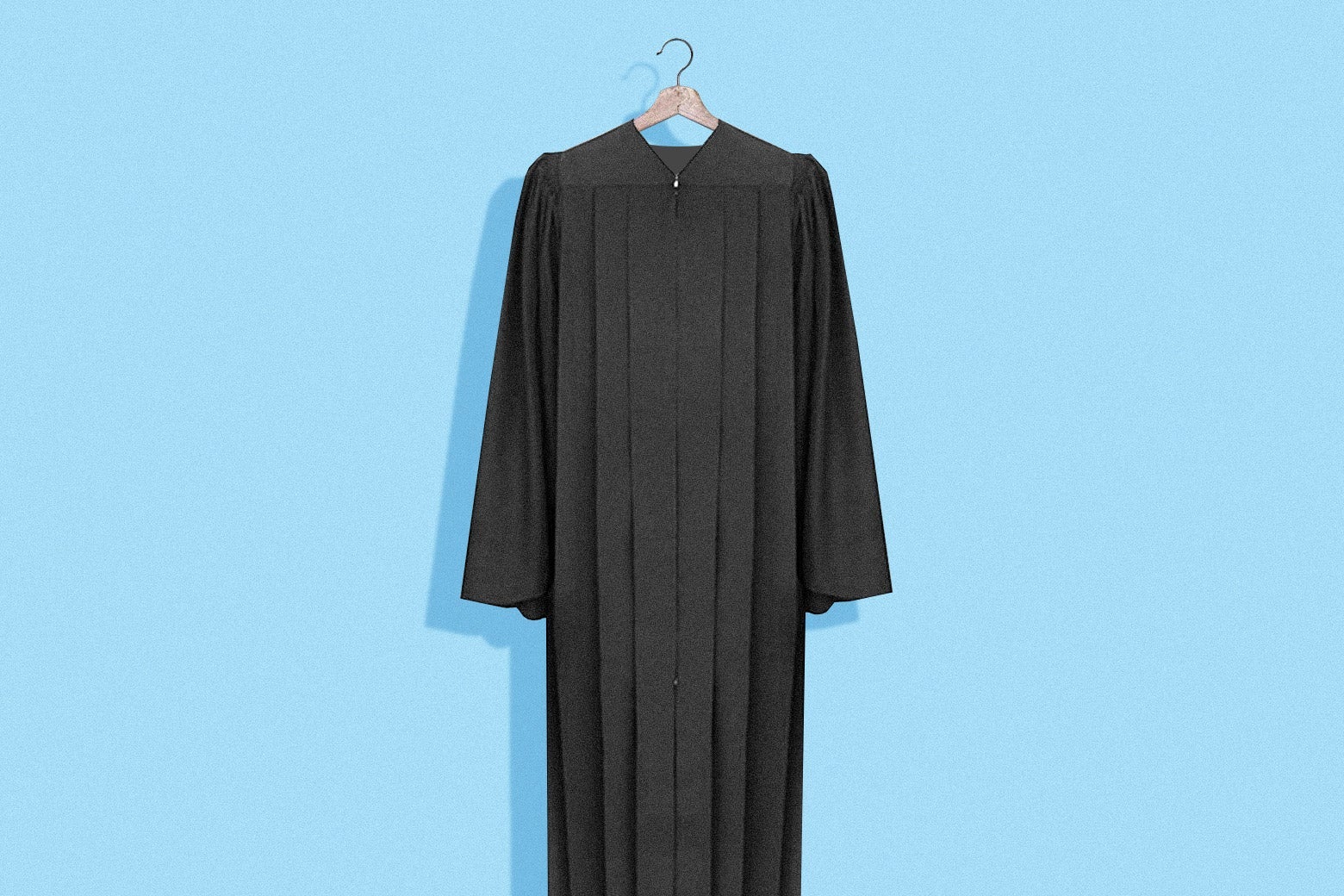 A judge's robes on a hanger.