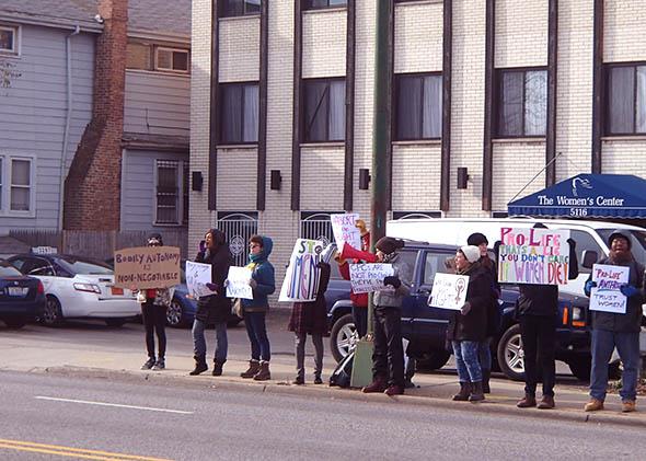 Members of Chicago feminist group FURIE protest crisis pregnancy