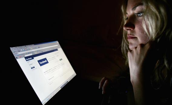 Woman browses Facebook on July 10, 2007 in London, England. 
