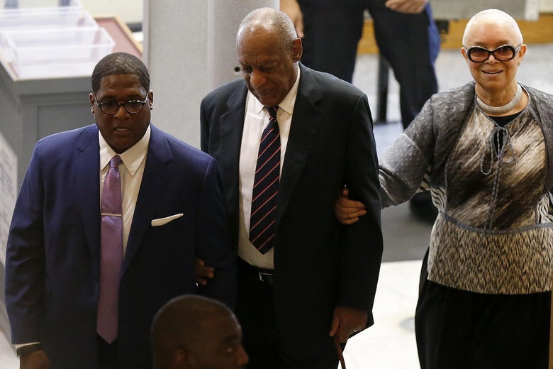 NORRISTOWN, PA - JUNE 12:  Bill (C) and Camille Cosby and aide Andrew Wyatt enter the Montgomery County Courthouse on June 12, 2017 in in Norristown, Pennsylvania. A former Temple University employee alleges that the entertainer drugged and molested her in 2004 at his home in suburban Philadelphia.  More than 40 women have accused the 79-year-old entertainer of sexual assault.  (Photo by David Maialetti-Pool/Getty Images)