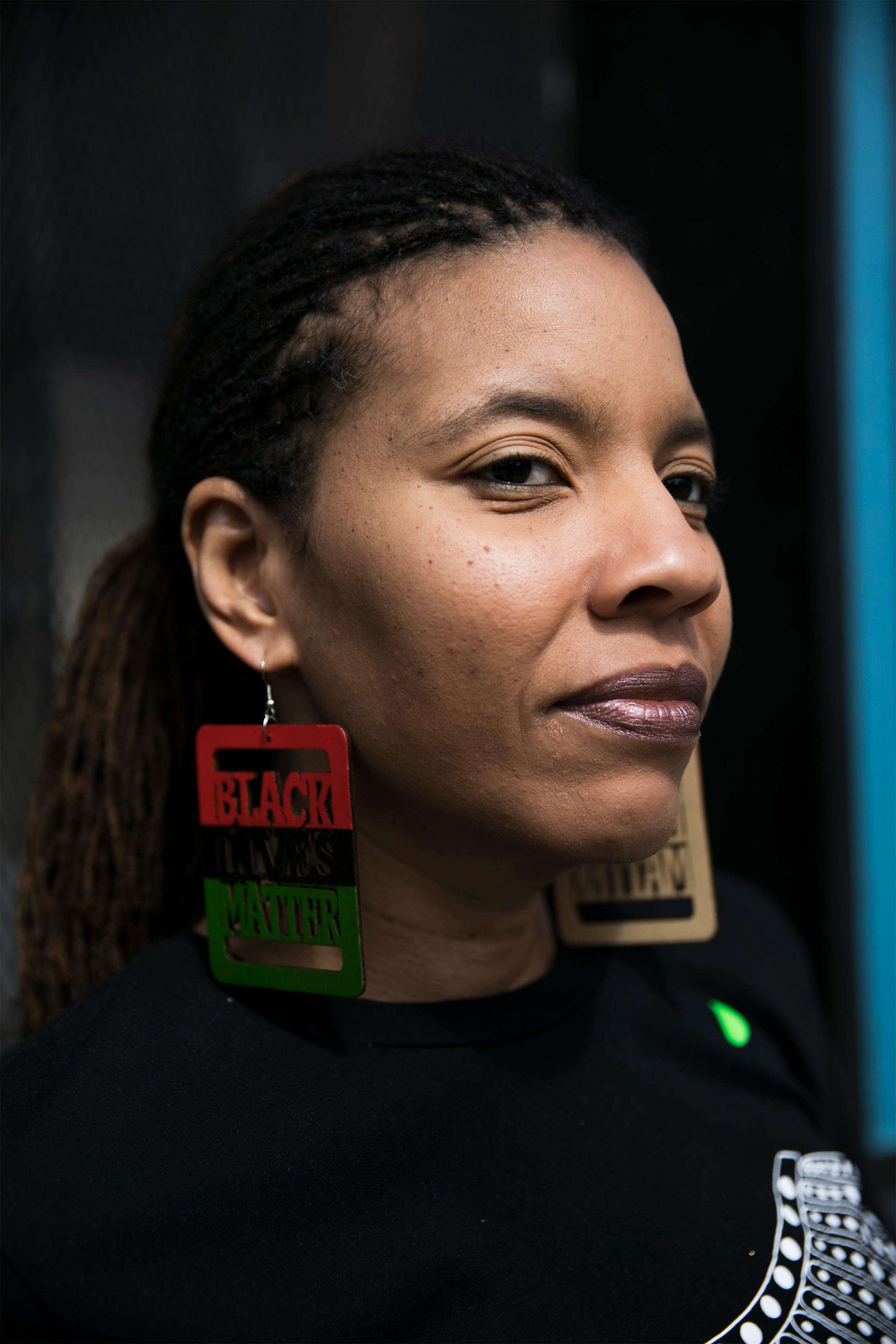 Leesha Thrower waits in line at the Bogart's stop on May 11 in Cincinnati
