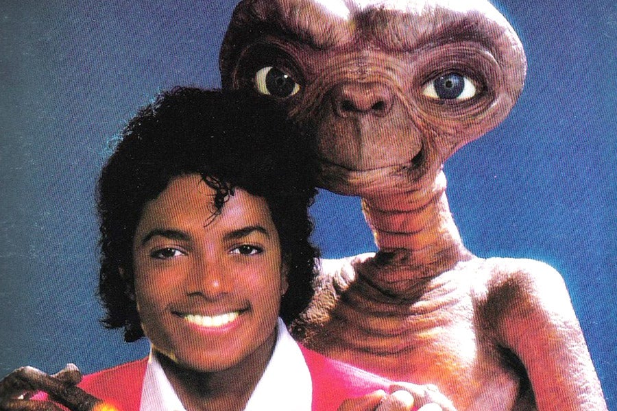 A photo of Michael Jackson and E.T. from the audiobook for E.T. the Extra-Terrestrial.