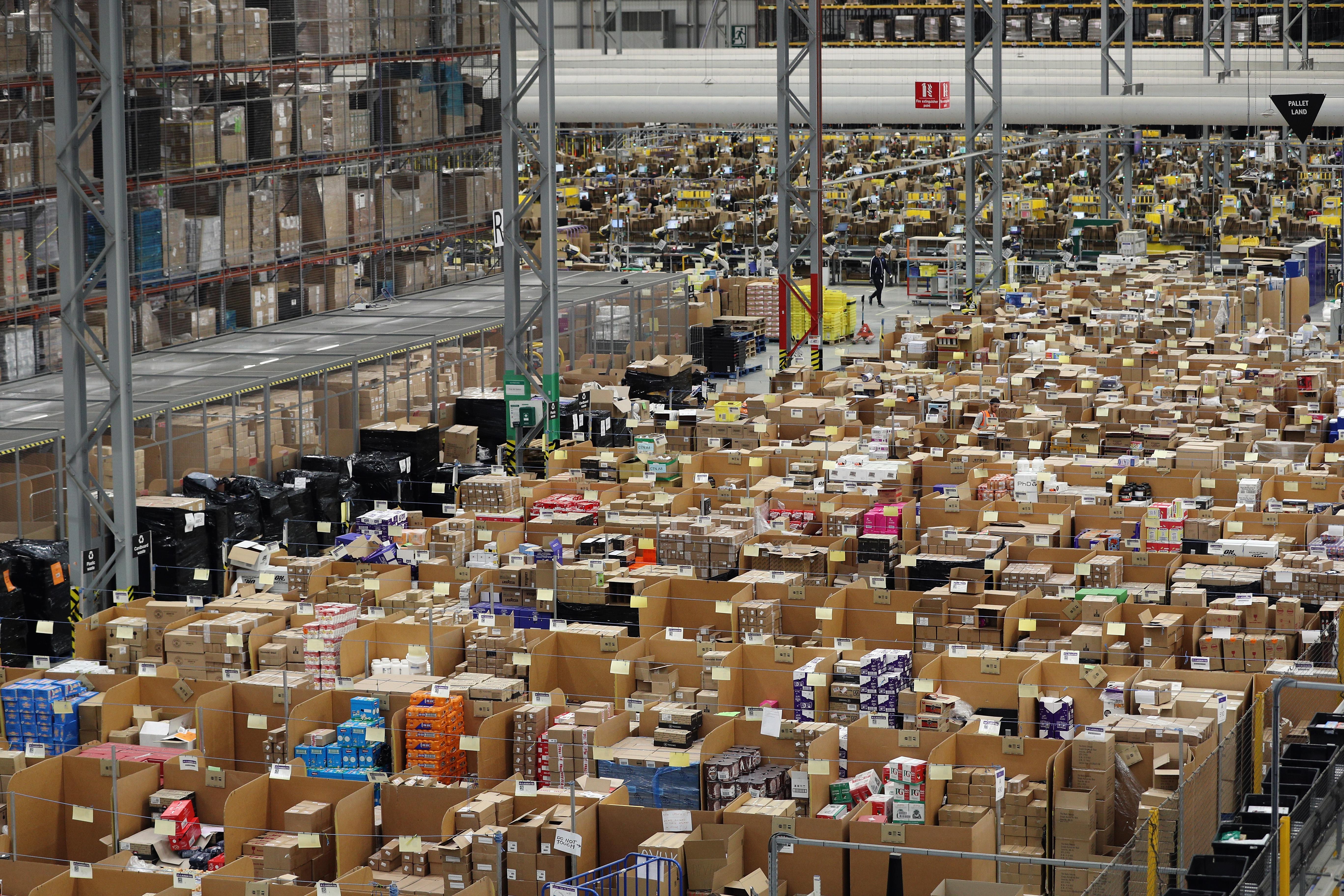 PETERBOROUGH, ENGLAND - NOVEMBER 15:  Parcels are processed and prepared for dispatch at Amazon's fulfillment centre on November 15, 2016 in Peterborough, England. In the lead up to Christmas, Amazon is experiencing the busiest time of the year.  (Photo by Dan Kitwood/Getty Images)