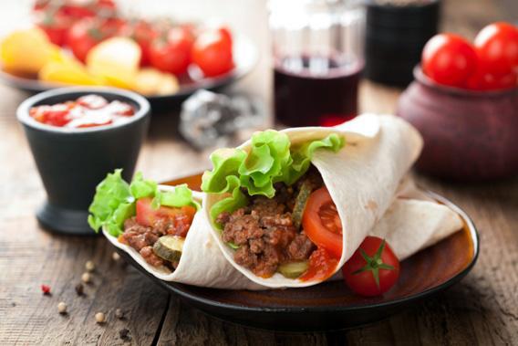 Tortilla wraps with meat and vegetables.